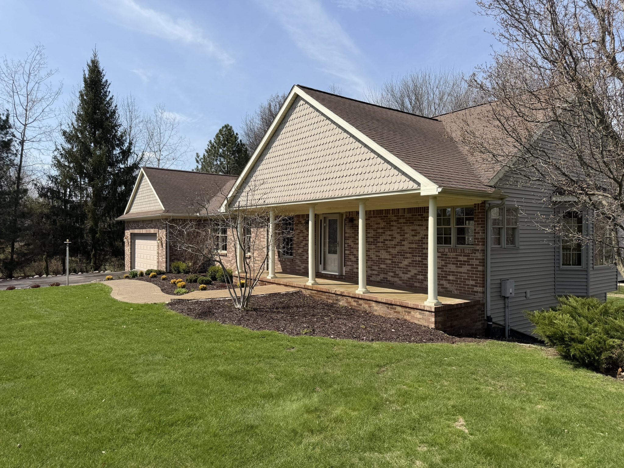 Front exterior — brick with covered porch