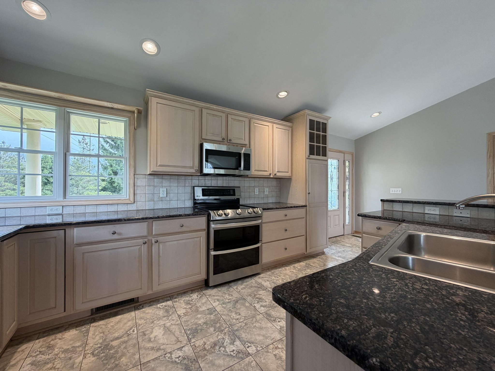 Kitchen — cabinetry and range