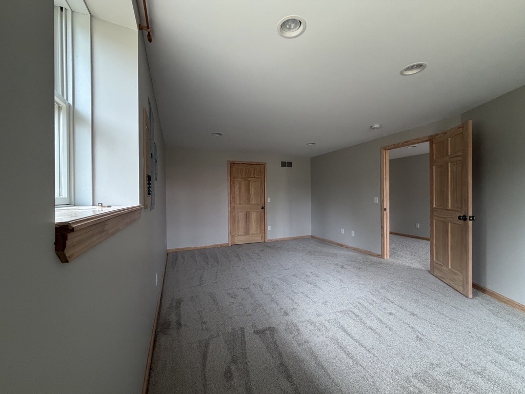 Lower level foyer with French door entry