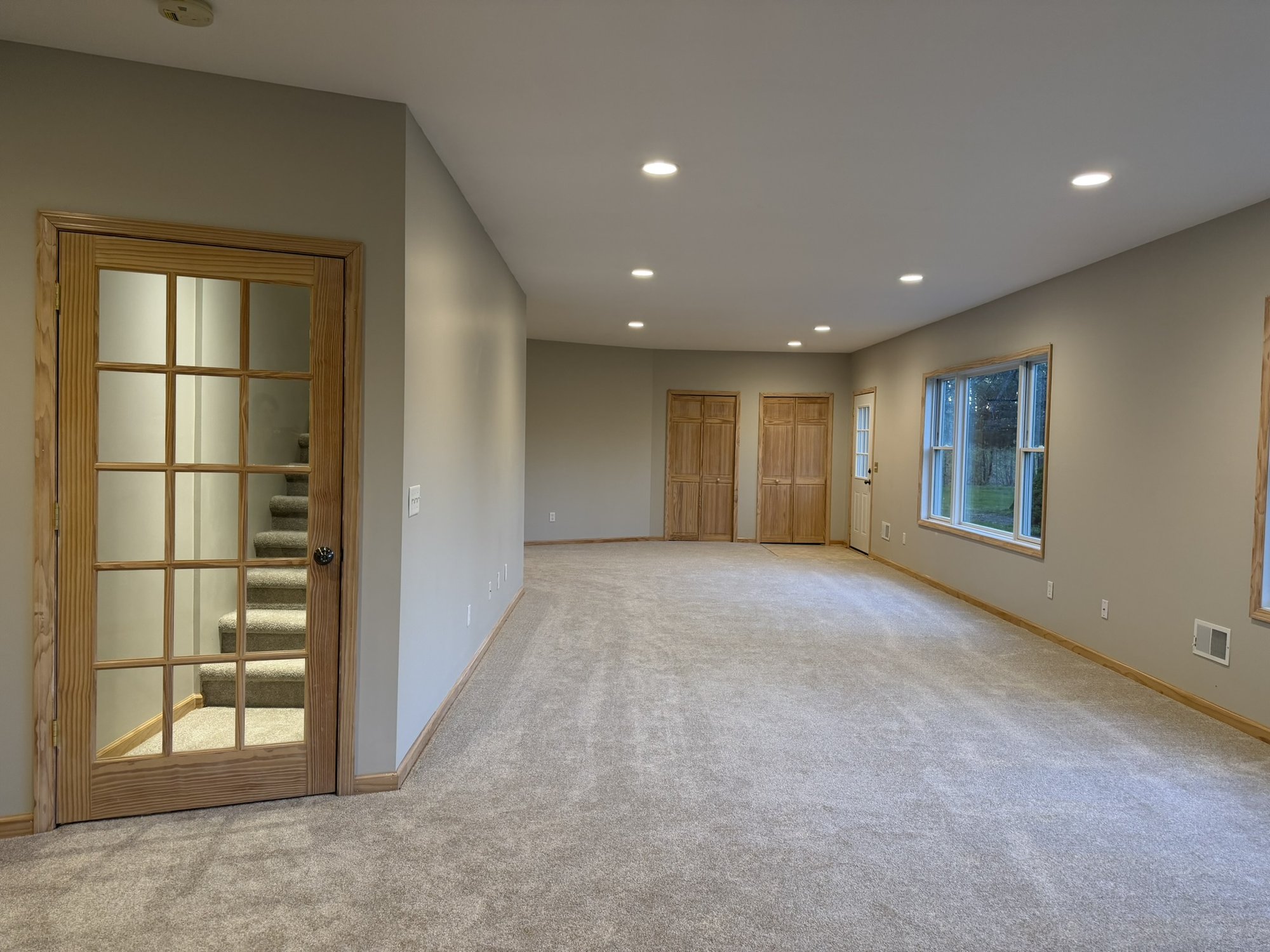 Lower level — open layout viewed from foyer